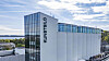 Kunstsilo-bygningen ved vannet i Kristiansand, med KUNSTSILO-logo på fasaden.